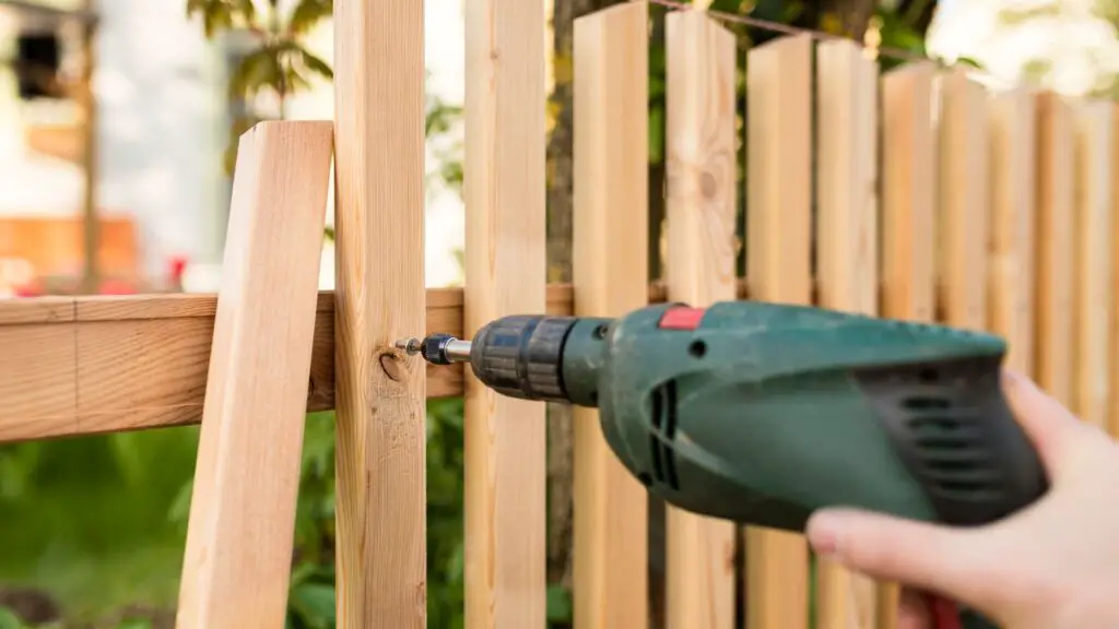 This is me doing some repair on the fence sagging from its original location